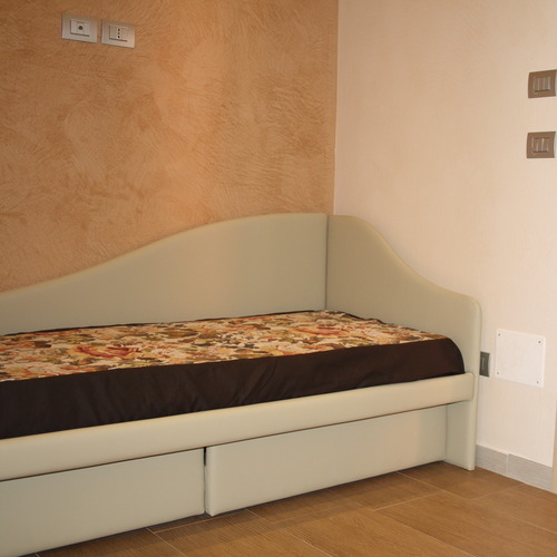 Letto singolo in camera da let